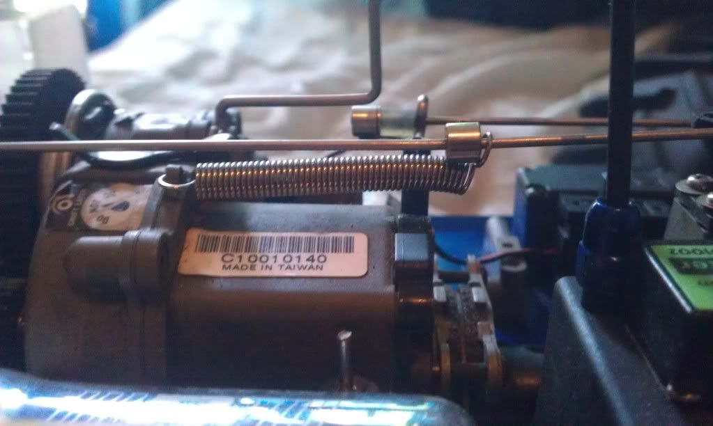 TMAXX Throttle Return Spring setup?